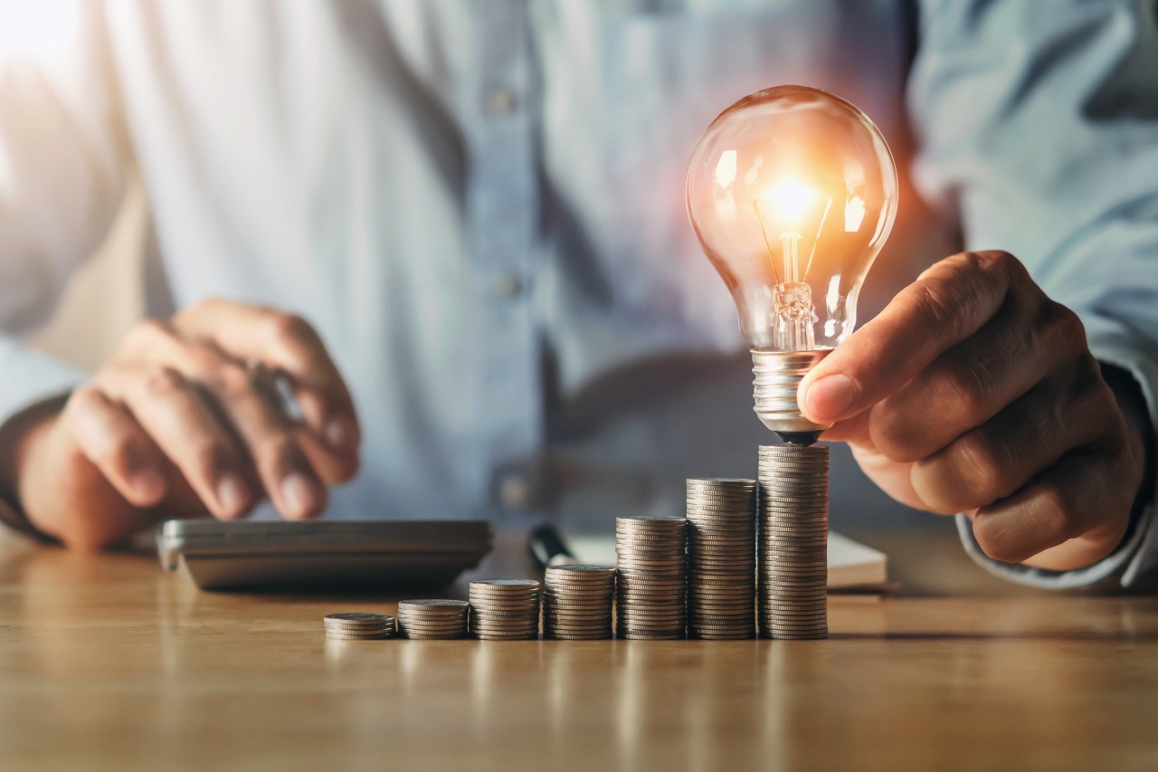 businessman-hand-holding-light-bulb-idea-concept-with-innovation-inspiration-idea-finance-accounting