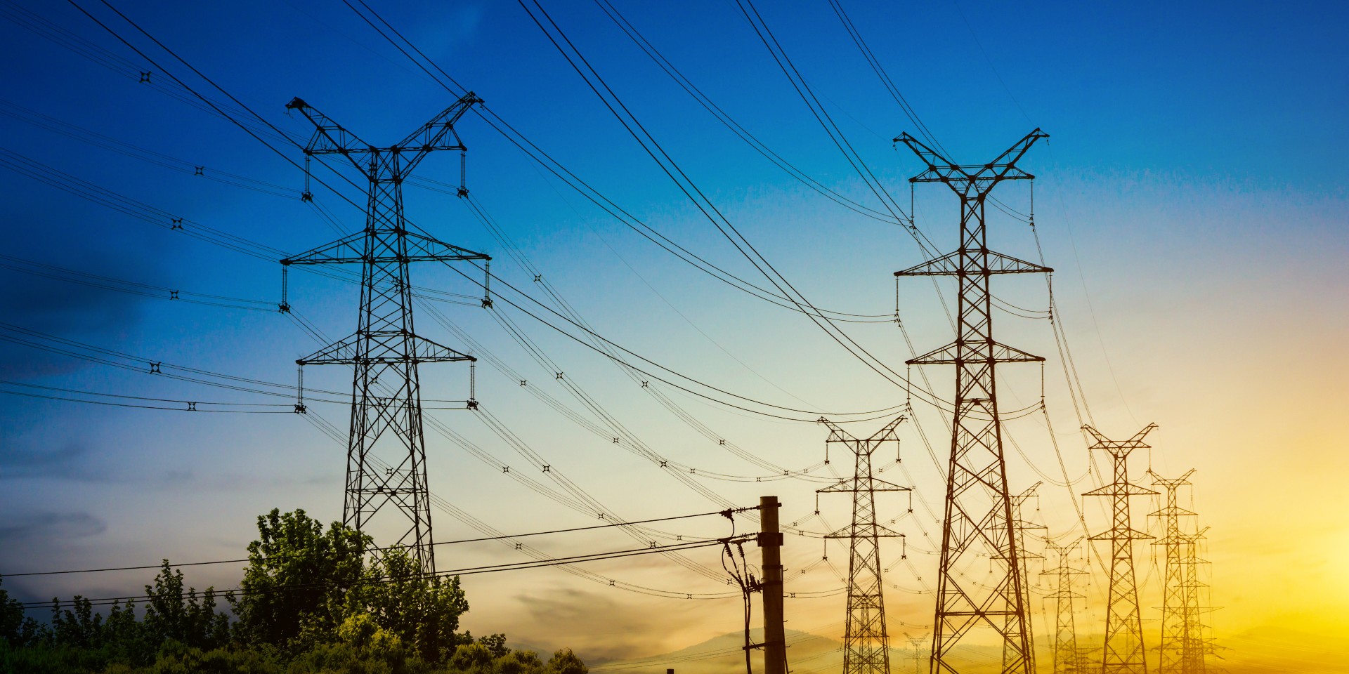 sun-setting-silhouette-electricity-pylons sun-setting-silhouette-electricity-pylons
